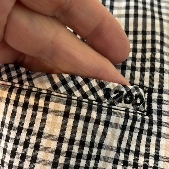 Izod of stretch black/ white/beige plaid skorts with black undershorts. Size 10. - Picture 7 of 11